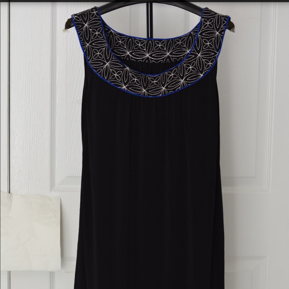 Women’s evening dress with fancy trims. (Sample)